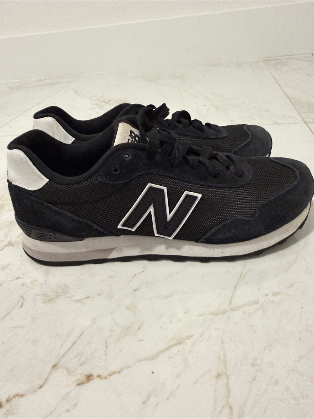 New Balance Men's Black and White Low-Top Sneakers